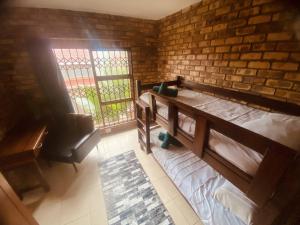 A bed or beds in a room at Check Point