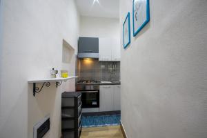 Kuchyň nebo kuchyňský kout v ubytování Casa Vacanza Terra Mia