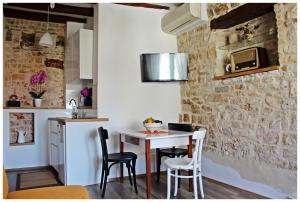 Kuchyň nebo kuchyňský kout v ubytování Guest House Tragurion