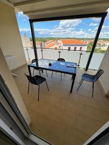 Μπαλκόνι ή βεράντα στο Apartments Funtana with pool