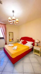 Postel nebo postele na pokoji v ubytování Suite Casa Santicelli Maratea + 10 fotografií