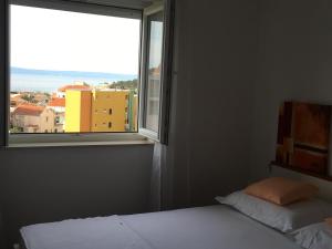 Postel nebo postele na pokoji v ubytování Apartment Marijeta Makarska