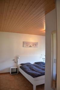 Postel nebo postele na pokoji v ubytování Ferienwohnung Sonnmatt
