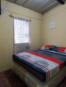 Katil atau katil-katil dalam bilik di Room Buganvilia