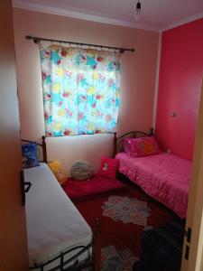 Uma cama ou camas num quarto em Alura