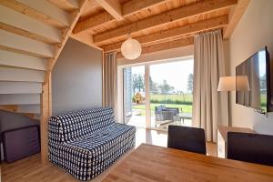Χώρος καθιστικού στο Kulawa Mewa Apartamenty