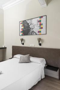 Postel nebo postele na pokoji v ubytování NWT Central Station Valencia