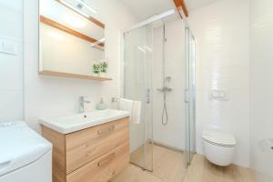 Kúpeľňa v ubytovaní Apartments Batela + 37 fotografií