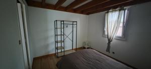 Postel nebo postele na pokoji v ubytování Logement à Saint-Palais-sur-Mer