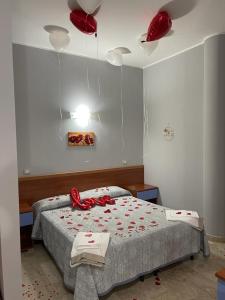 A bed or beds in a room at Il Viandante Catenanuova