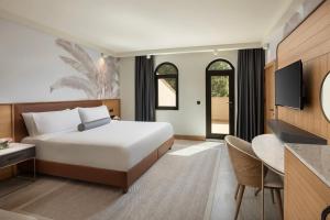 Postel nebo postele na pokoji v ubytování Sirene Belek Hotel + 37 fotografií