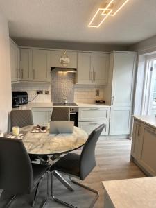 Η κουζίνα ή μικρή κουζίνα στο Home from home Cosy 4 bed