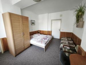 Postel nebo postele na pokoji v ubytování Pension Pod Šibeňákem