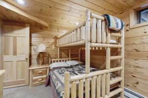 En eller flere senge i et værelse på Lodge at Moosehead Lake