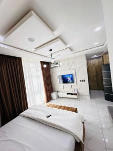 Ένα ή περισσότερα κρεβάτια σε δωμάτιο στο Christable Apartment +5 φωτογραφίες