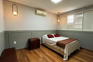Postel nebo postele na pokoji v ubytování Hotel dos Lagos