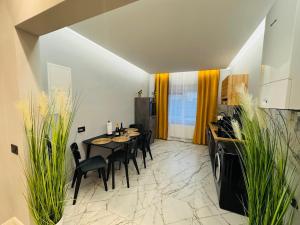 a dining room with a table and chairs at VIP Apartment Essen in Essen
