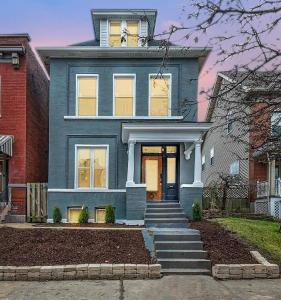 a blue house with a red brick at St. Louis Luxury Home 3BR/3.5BA Near Everything in Soulard