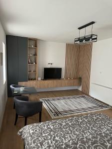 Primo apartmani的电视和/或娱乐中心