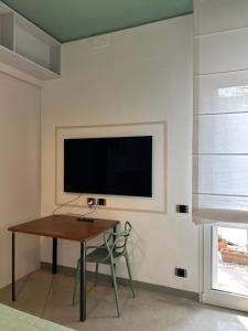 TV a/nebo společenská místnost v ubytování A CASA DI MARIANNA
