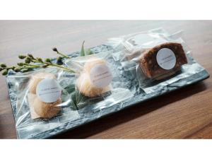 a plastic tray with three rolls and a piece of bread at Tanegashima Araki Hotel Bekkan - Vacation STAY 57001v in Nishinoomote
