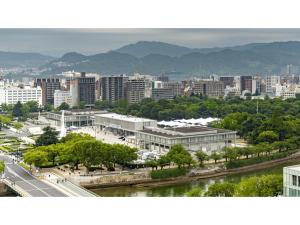 a view of a city with a river and buildings at THE KNOT HIROSHIMA - Vacation STAY 20573v in Hiroshima +15 photos