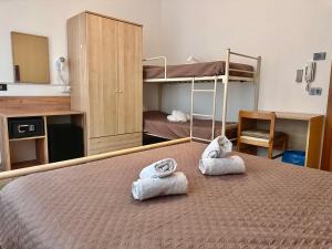 Postel nebo postele na pokoji v ubytování Hotel Edera