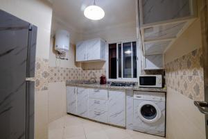 Η κουζίνα ή μικρή κουζίνα στο Charming and quiet apartment 2