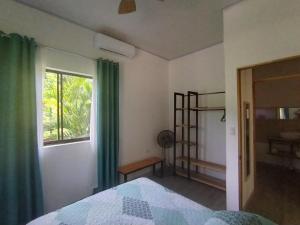 Postel nebo postele na pokoji v ubytování Serenity Houses + 20 fotografií