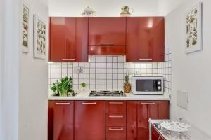 Η κουζίνα ή μικρή κουζίνα στο GOLDEN LUXE - 2 camere con vista sul Duomo