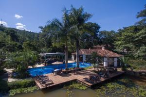 an aerial view of a resort with a swimming pool at Hotel Fazenda União in Rio das Flores