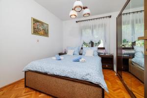 Postel nebo postele na pokoji v ubytování Apartment Katarina