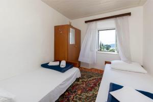Postel nebo postele na pokoji v ubytování House Villa Marija