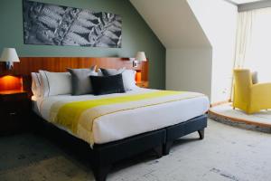 Postel nebo postele na pokoji v ubytování Park Lake Luxury Hotel