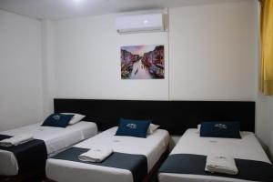 Postel nebo postele na pokoji v ubytování Hotel Estancia Real + 22 fotografií