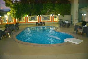 Bazén v ubytování AraCan Pyramids Hotel By Versailles nebo v jeho okolí