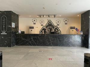 Vstupní hala nebo recepce v ubytování AraCan Pyramids Hotel By Versailles