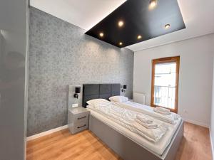 Posteľ alebo postele v izbe v ubytovaní ApartmentPrestige Central Station