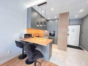 Kuchyňa alebo kuchynka v ubytovaní ApartmentPrestige Central Station