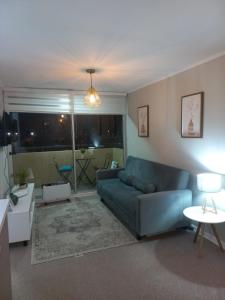 Posezení v ubytování Agradable departamento familiar en Los Andes