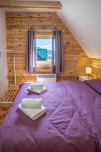 Postel nebo postele na pokoji v ubytování Sunny Village - Vila Otter