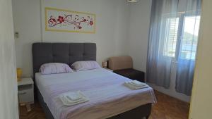 Posteľ alebo postele v izbe v ubytovaní Apartments by the sea Cove Saplunara, Mljet - 12849