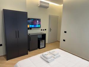 Postel nebo postele na pokoji v ubytování Hotel Tuyo
