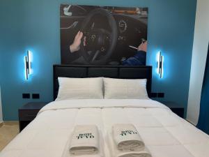 Postel nebo postele na pokoji v ubytování Hotel Tuyo