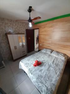 Postel nebo postele na pokoji v ubytování Casa aconchegante Piscina Churrasqueira Cabo-Frio RJ + 13 fotografií