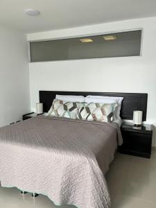 Ένα ή περισσότερα κρεβάτια σε δωμάτιο στο Hotel Villa María Coworking