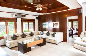 a living room with two couches and a coffee table at 4 Bedroom Villa in Chaweng P2 SDV194-By Samui Dream Villas in Chaweng