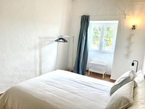 Postel nebo postele na pokoji v ubytování Toca das Manas