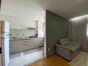 Køkken eller tekøkken på Apartamento com ar condicionado no Bairro Cabral