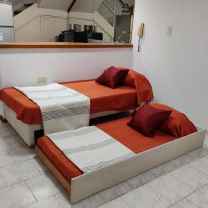 Postel nebo postele na pokoji v ubytování A 100 m de la plaza principal- Cancelacion gratuita- Sin tarjeta de crédito- Duplex Vino Wine